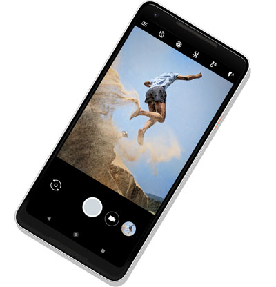 Top view of Google Pixel 2 angled to the left, with display showing a man jumping off a dune  